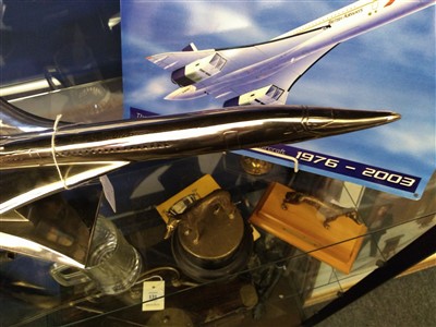 Lot 128 - An aluminium model of Concorde on stand