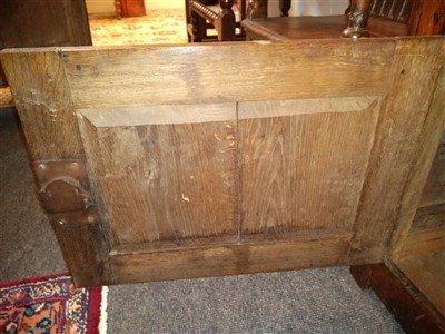 Lot 175 - A George III oak 'dog kennel' dresser