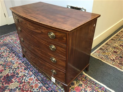 Lot 25 - A George III strung and crossbanded mahogany bow front chest of drawers