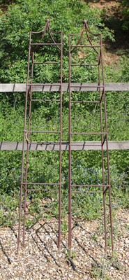 Lot 477 - A pair of hand forged wrought iron square section garden obelisks