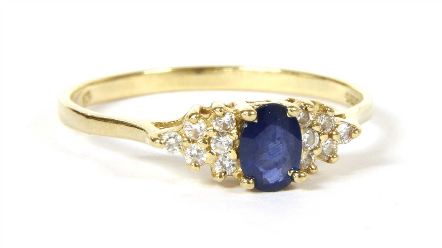 Lot 23 - A 9ct gold sapphire and cubic zirconia ring