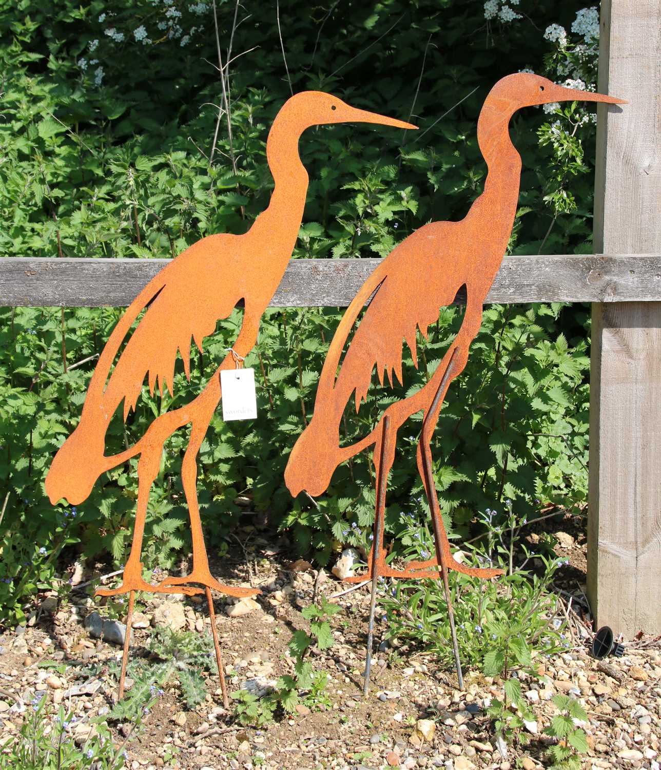 Lot 484 - A pair of life size metal garden silhouettes of herons