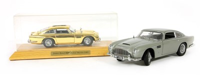 Lot 93 - A Franklin Mint James Bond 007 gold painted Aston martin DBS