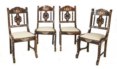 Lot 738 - A set of four Indian rosewood and ivory inlaid chairs