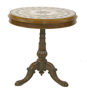 Lot 669 - A specimen marble and mahogany centre table