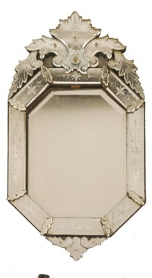 Lot 657 - A Venetian glass wall mirror