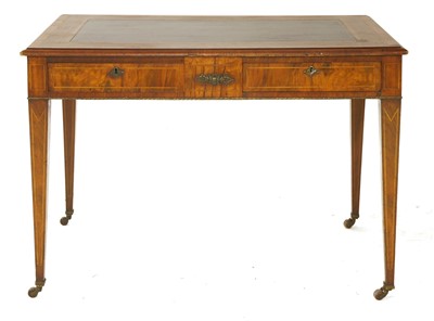 Lot 677 - A continental walnut writing table