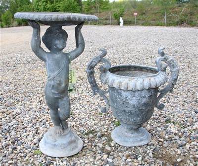 Lot 492 - A figural lead bird bath