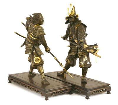 Lot 213 - A pair of Japanese Miyao-style parcel gilt bronze figures