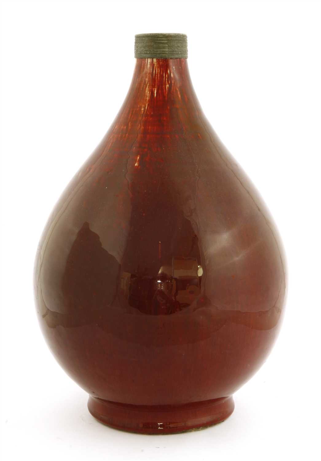 Lot 46 - A Chinese copper red glazed vase