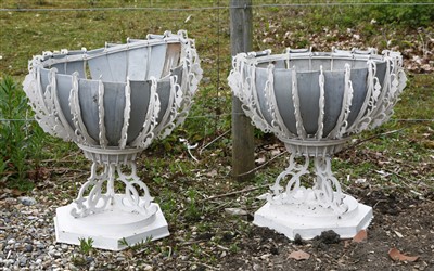 Lot 787 - A pair of rare Victorian painted cast and wrought iron planters