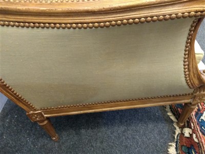 Lot 110 - A pair of French upholstered library chairs