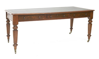 Lot 102 - A Victorian burr walnut and oak library table