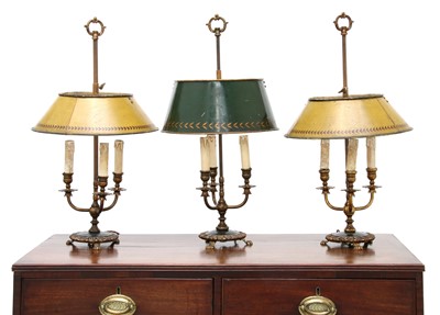 Lot 301 - A pair of brassed metal three-branch table lamps