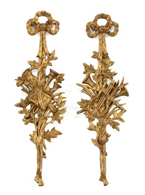 Lot 663 - A pair of composite gilt appliqués