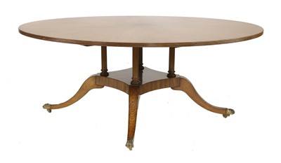 Lot 604 - A Regency-style rosewood circular dining table