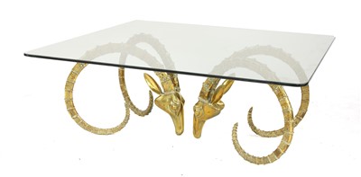 Lot 662 - A contemporary brass and glass coffee table