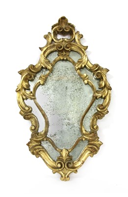 Lot 426 - A George III style composite wall mirror