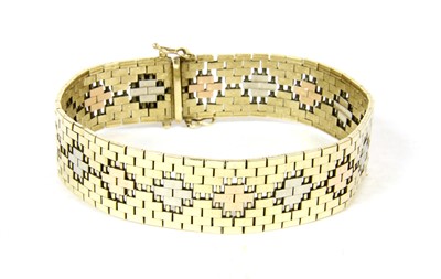 Lot 22 - A 9ct three colour gold brick link bracelet