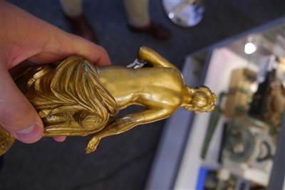 Lot 195 - A gilt bronze figure holding a dove