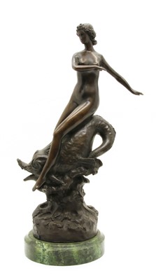 Lot 259 - A bronze figure of a nude female riding a sea creature