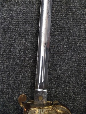 Lot 140 - A Royal Naval Officer's sword