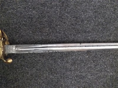 Lot 140 - A Royal Naval Officer's sword