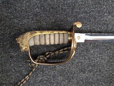 Lot 140 - A Royal Naval Officer's sword