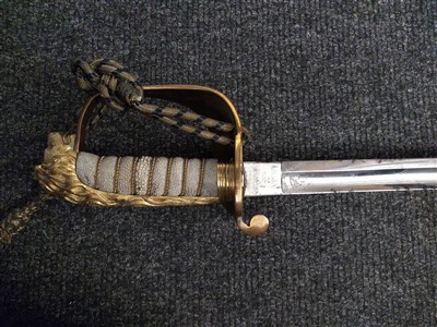 Lot 140 - A Royal Naval Officer's sword
