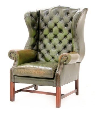 Lot 113 - A George III-style wing armchair