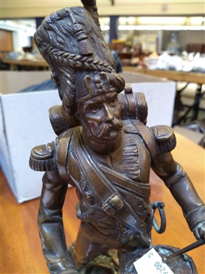 Lot 145 - A bronze figure of a French Grenadier drummer