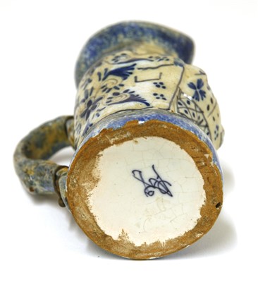 Lot 181 - An unusual Delft toby jug