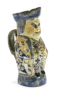 Lot 181 - An unusual Delft toby jug