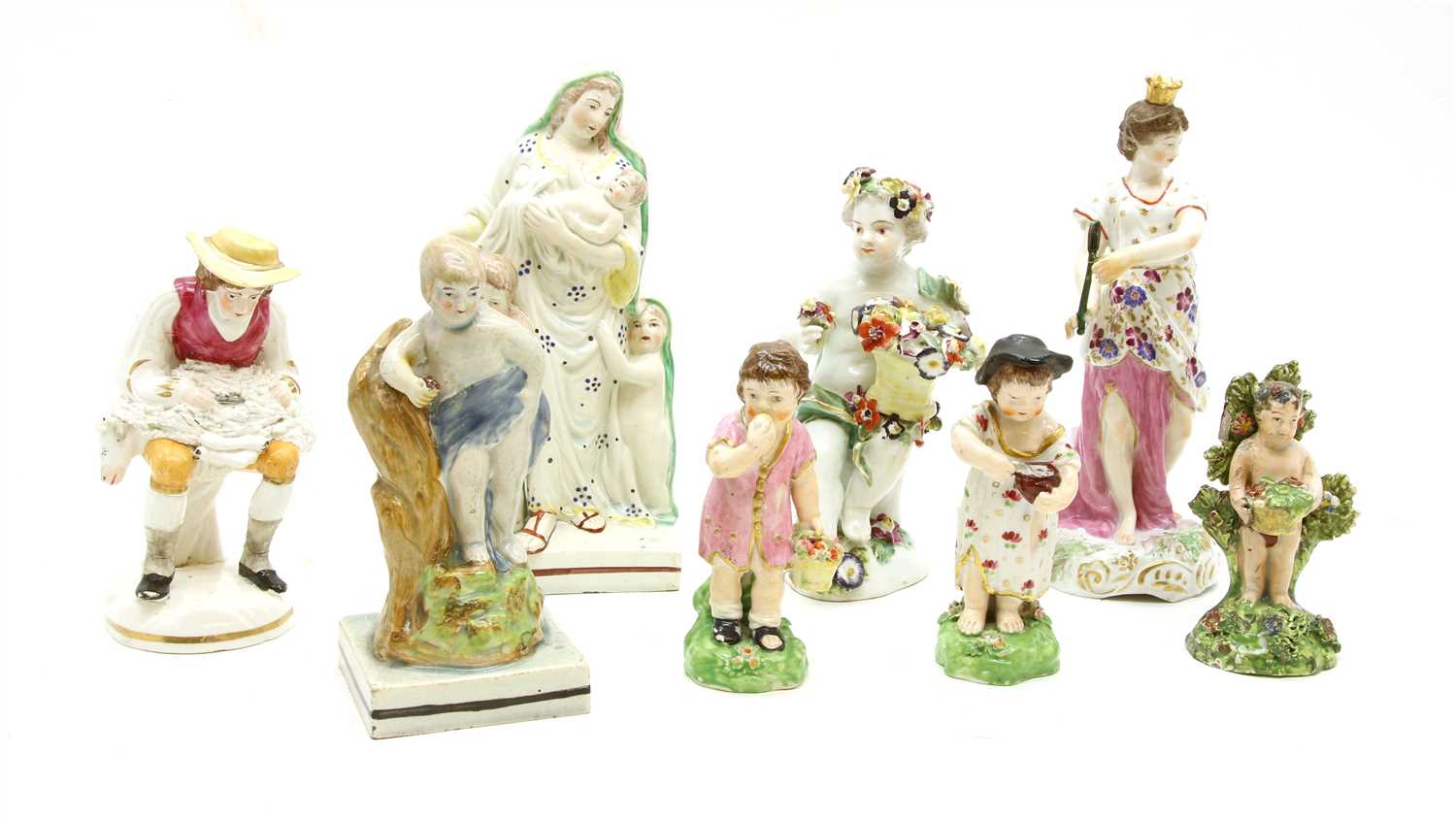 Lot 115 - A collection of 18th and 19th Century porcelain and pottery figures