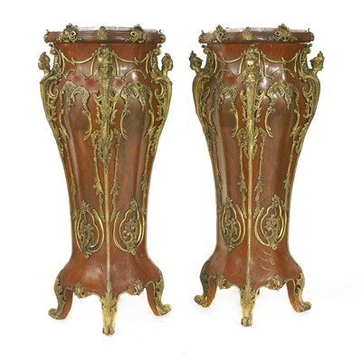 Lot 662 - A pair of Louis XVI-style pedestals