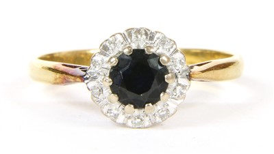 Lot 16A - A sapphire and diamond cluster ring