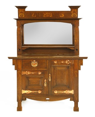 Lot 77 - An Arts and Crafts inlaid oak, mirrored back sideboard