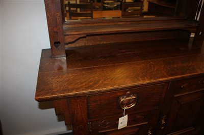 Lot 77 - An Arts and Crafts inlaid oak, mirrored back sideboard