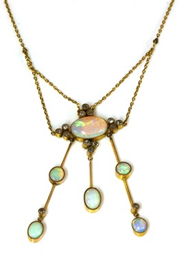 Lot 90 - An Edwardian opal and diamond négligée pendant