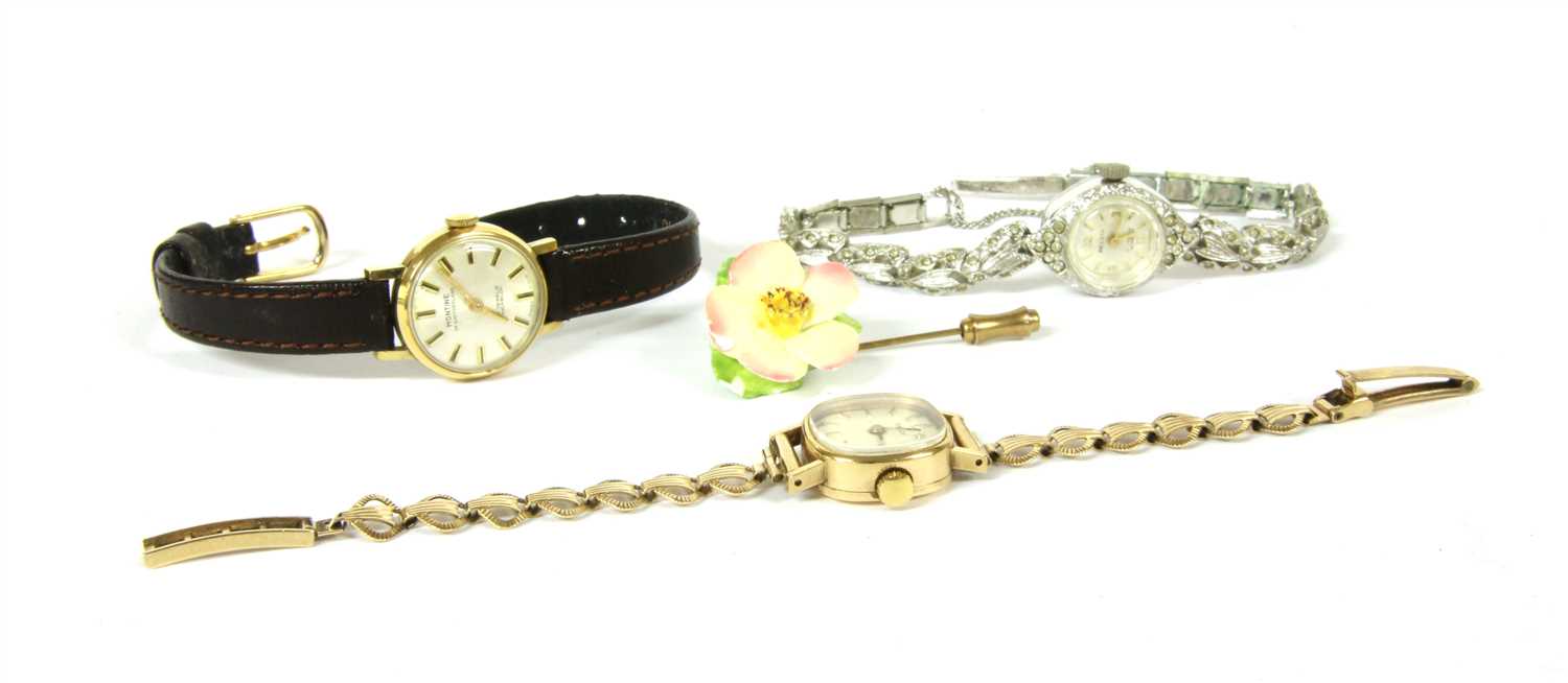 Lot 14 - A ladies 9ct gold Tissot mechanical watch