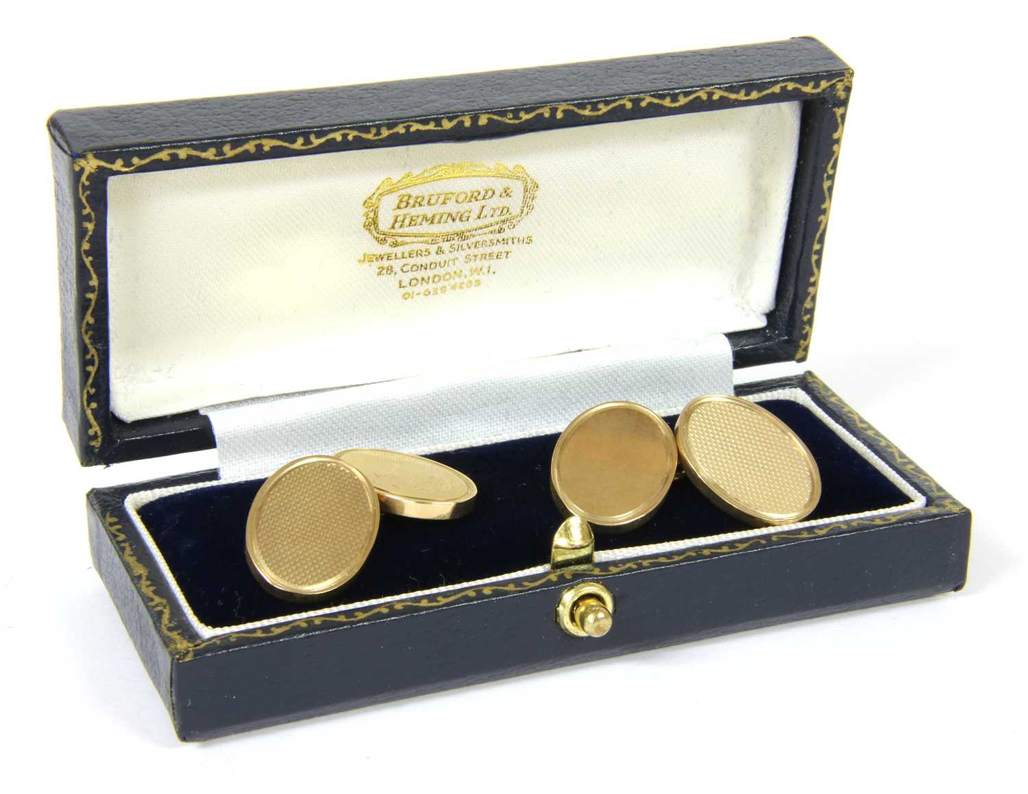 Lot 6 - A pair of 9ct gold oval chain link cufflinks