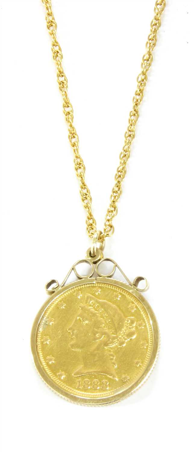 Lot 23 - A five dollar gold coin pendant