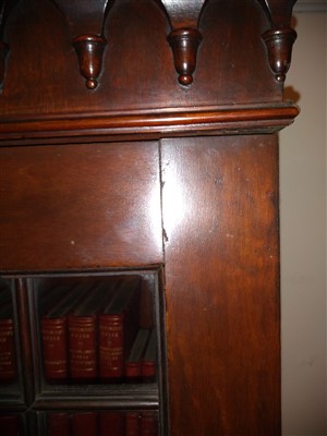 Lot 148 - A George III-style mahogany breakfront bookcase