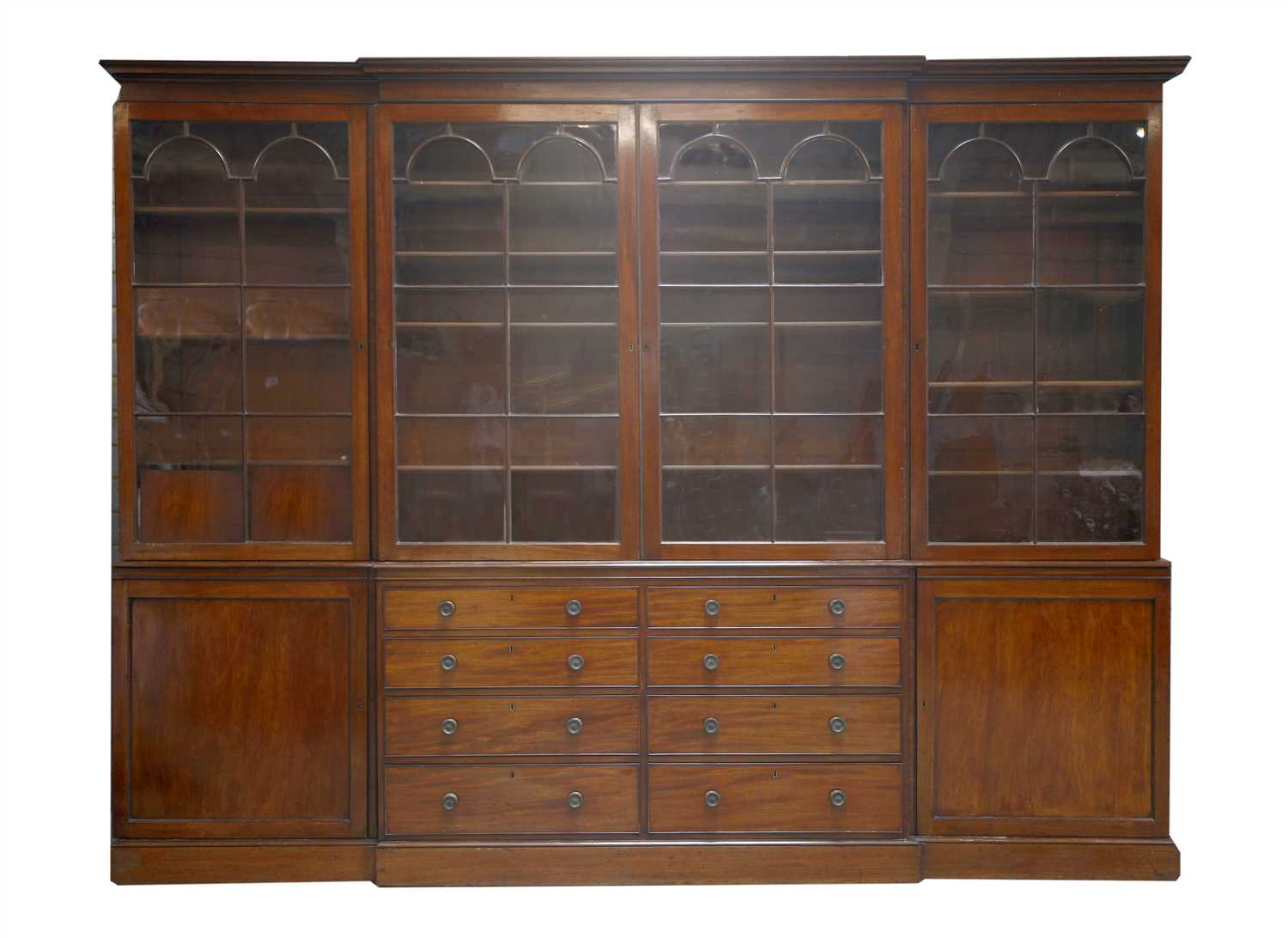 Lot 130 - A George III-style mahogany breakfront bookcase