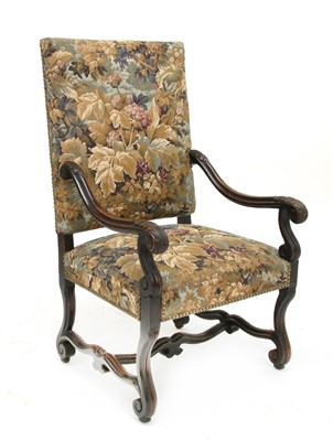 Lot 214 - A French beechwood elbow chair