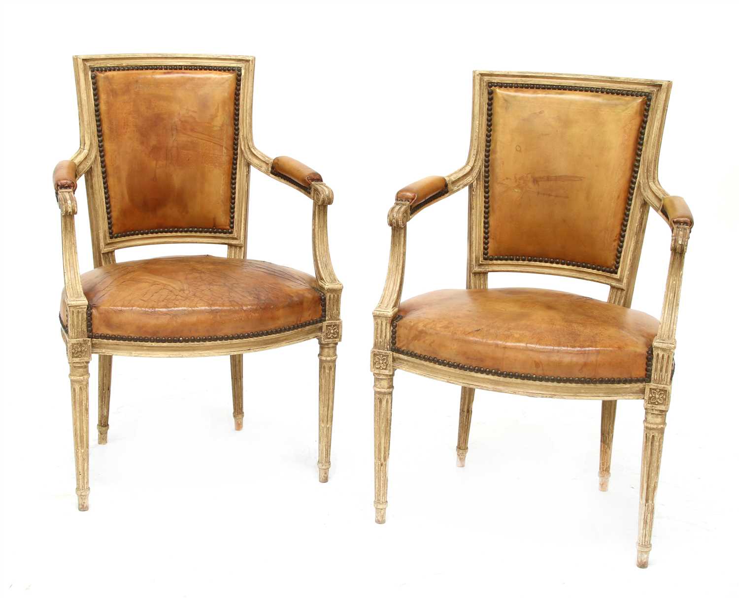Lot 38 - A pair of Louis XVI-style elbow chairs