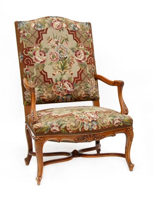 Lot 353 - A Louis XV-style beechwood elbow chair