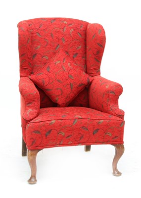 Lot 340 - A wing armchair