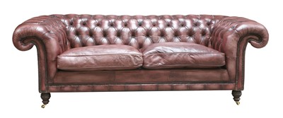 Lot 119 - A modern leather three-seater chesterfield settee