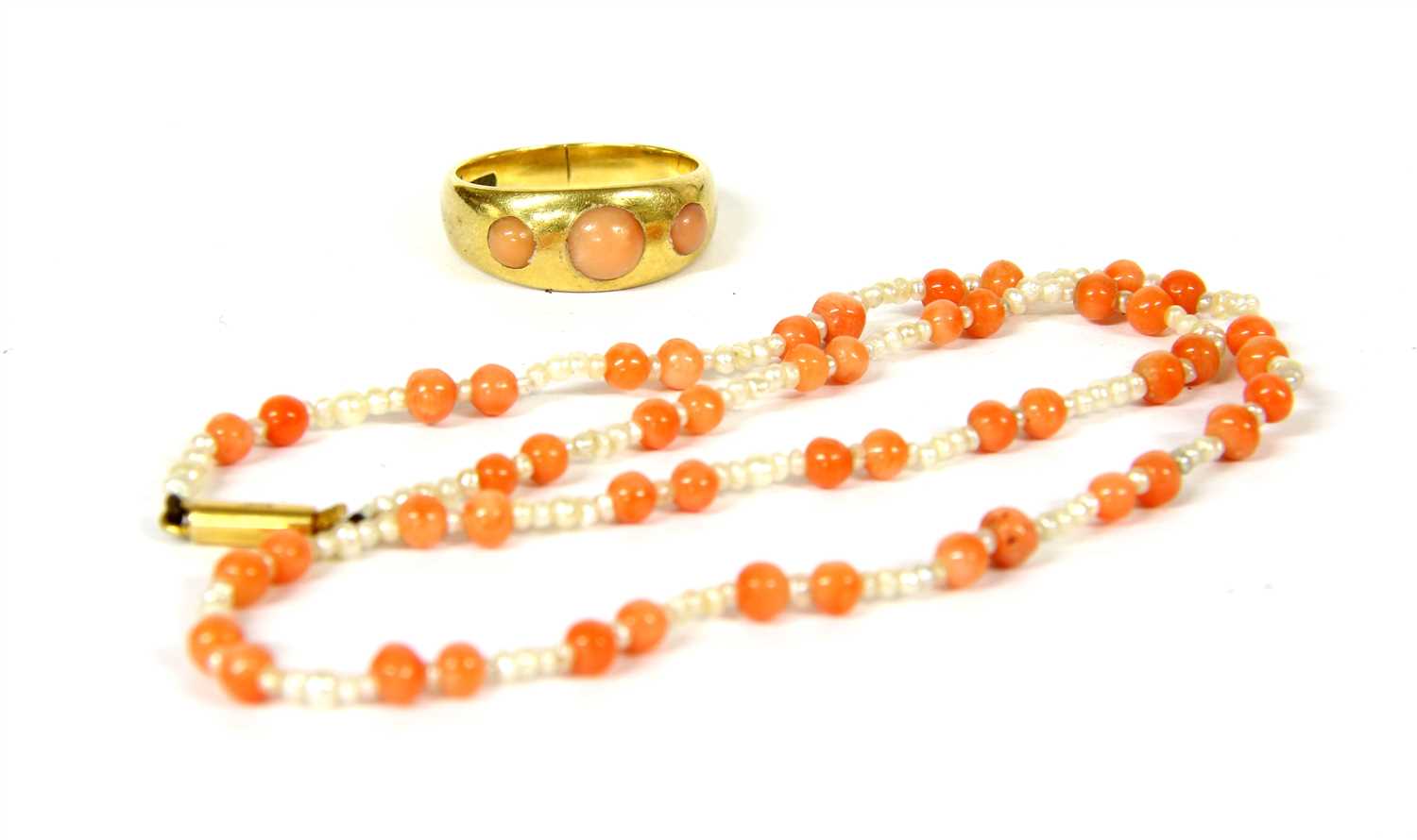 Lot 26 - A child's seed pearl and coral bead necklace